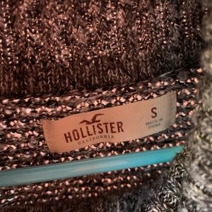 Turtle neck sweater with shoulder cut out